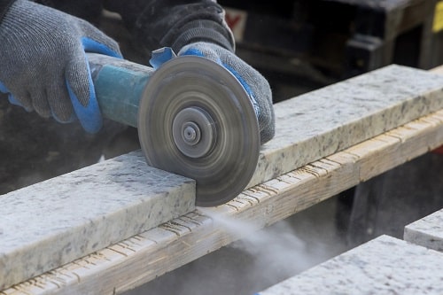 Cutting stone iStock photovs